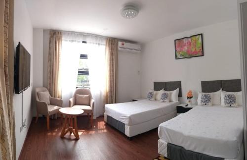 Bandar Seri Begawan House | Coconut Bay Lodge: Family-Friendly Retreat with Breakfast Included