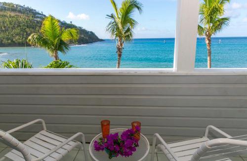 Estate Enighed Apartment | Beachfront Bliss at Coconut Coast Villas - Rated 8.6/10