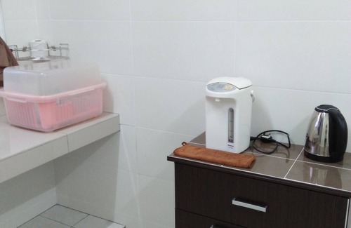 Tanjung Karang House | Bright and Inviting Coconut HomeStay Tanjong Karang