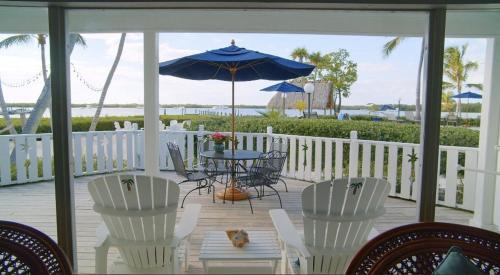Tavernier Hotel | Experience Coconut Palm Inn: Oceanfront Bliss Awaiting You