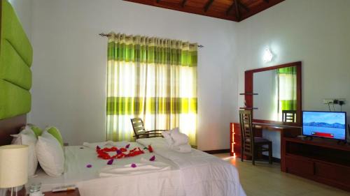 Udunuwara Hotel | Unforgettable Cogent Holiday Home: Top-Rated with Pool & Hot Tub