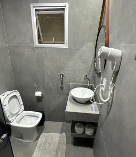 Parque da Areia Preta Apartment | Explore Colecione Histórias Guarapari with Oceanfront Views