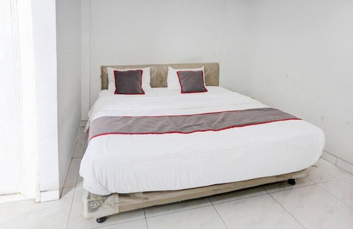 Tangerang Hotel | Budget-Friendly Stay at OYO 92003 Sky Airlines Guesthouse
