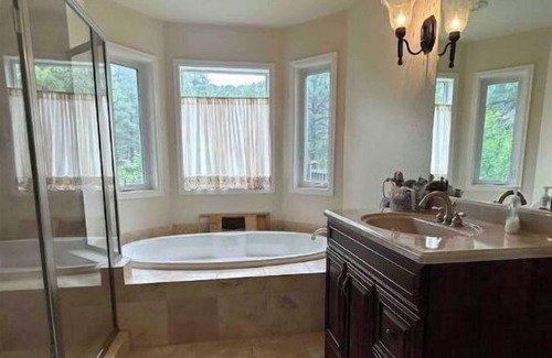 Beulah House | Top-Rated Colorado Creekside Getaway with Pool & Breakfast