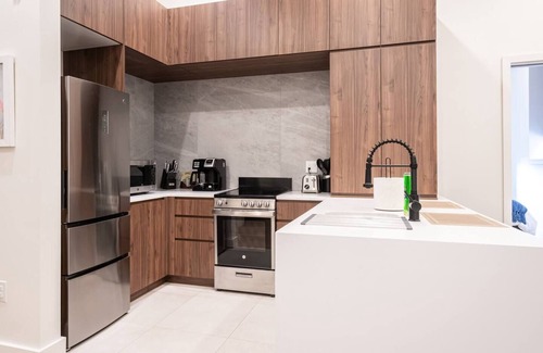 Central Business District Hotel | Vibrant 1 BR Near Penn Station - Family-Friendly Amenities