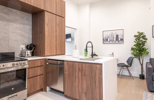 Central Business District Hotel | Vibrant 1 BR Near Penn Station - Family-Friendly Amenities