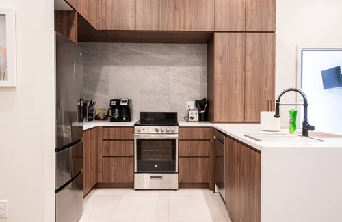Central Business District Hotel | Vibrant 1 BR Near Penn Station - Family-Friendly Amenities