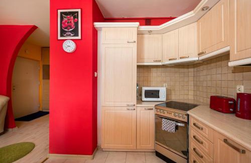 Ursynow Apartment | Colour Power Apartment by BookingHost