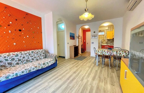 Porto Santa Margherita Apartment | Vibrant Flat with Terrace and Spa - Beahost Awaits You
