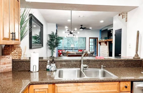 New Braunfels Condo | Comal River View 2BR Condo Steps to Schlitterbahn with Pool Sleeps8