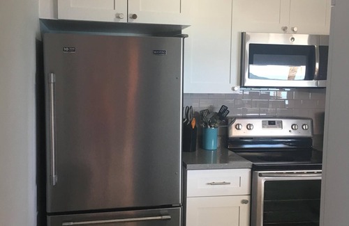 Estate Two Brothers Condo | Enjoy 5 Miles of Beach with a 10% Discount on Stays!