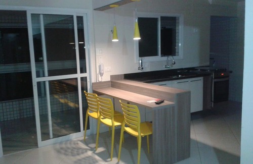 Praia Grande Condo | Sea View Haven: Enjoy a Balcony with Barbecue & Spa