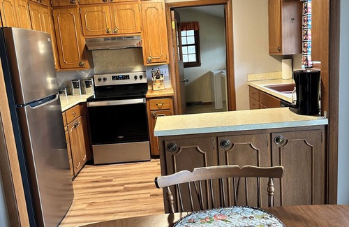 Knoxville House | Relax at The Porter House: King Beds & Game Room Awaits
