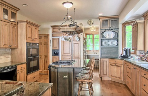 Interlochen House | Discover Serenity at Our Beachfront Cottage with Spa & Pool