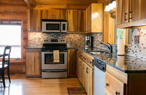 Magnet Cabin | Relaxing Log Cabin Getaway with River Views & Family Amenities