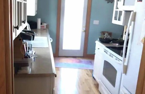 Elk Rapids House | Experience Vibrant Views and Relax in a Spa Oasis