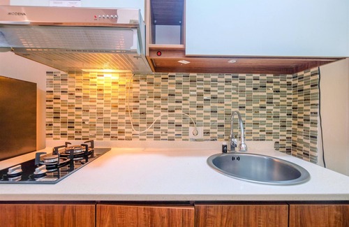 Kayu Putih Apartment | Cozy Living Studio at Tifolia Apartment with Breakfast