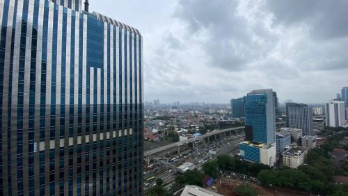 Mampang Prapatan Apartment | Modern 2BR Samara Suites with Pool Access on 26th Floor