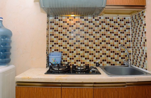 Kayu Putih Apartment | Modern Tifolia Apartment: Family-Friendly with Pool Access