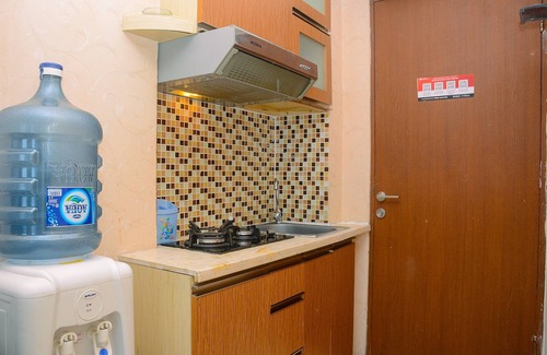 Kayu Putih Apartment | Modern Tifolia Apartment: Family-Friendly with Pool Access