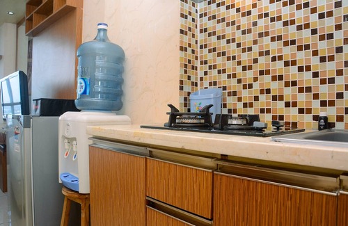 Kayu Putih Apartment | Modern Tifolia Apartment: Family-Friendly with Pool Access