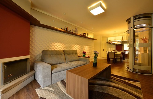 Campos do Jordao Apartment | Stylish Retreat with Ocean View, Steps from Baden