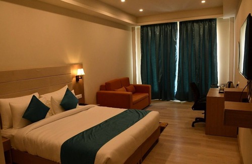 Bela Hotel | Budget-Friendly Comfort Inn Pratapvasini with Family Amenities
