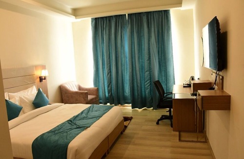 Bela Hotel | Budget-Friendly Comfort Inn Pratapvasini with Family Amenities