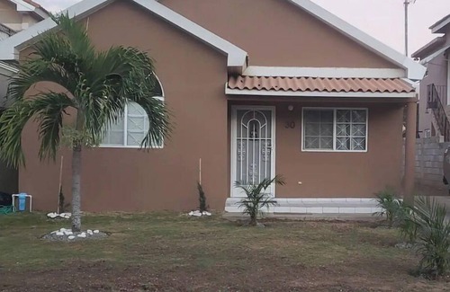 Caribbean Estates House | Cozy 2-Bedroom Retreat in Secure Gated Community