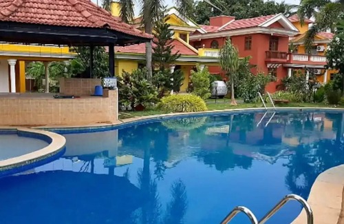 Majorda Apartment | Relaxing 2 BHK Retreat with Pool Near Betalbatim Beach