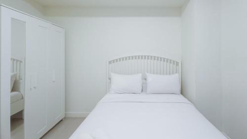 Makassar Apartment | Cozy 2BR Retreat at Vida View Apartment by Travelio