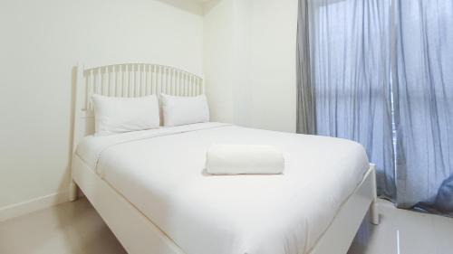 Makassar Apartment | Cozy 2BR Retreat at Vida View Apartment by Travelio