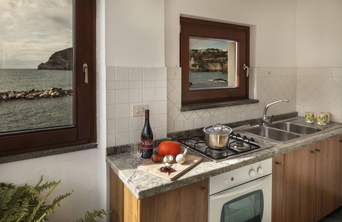 Sant'Angelo Apartment | Cozy Apartment with Sea Terrace, Perfect for Families