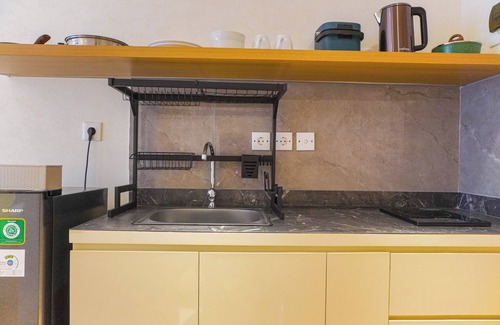 Grogol Utara Apartment | Cozy Riverside Studio with Kitchen & Breakfast in Tokyo