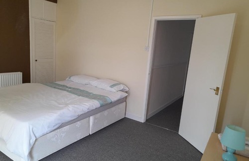 Neath House | Cozy Retreat: Pet & Child Friendly Accommodations Await