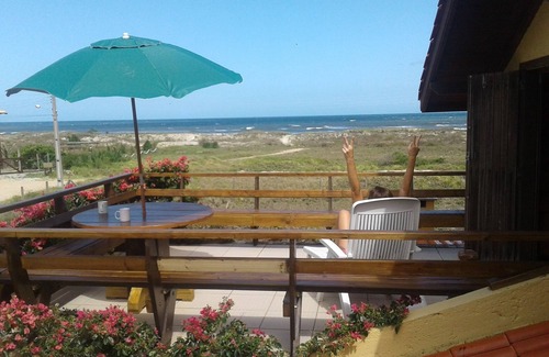 Barra de Ibiraquera House | Oceanfront Haven: Pet-Friendly with Wi-Fi at Ibiraquera Beach