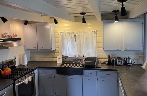 Margaretville Cabin | Cozy Log Cabin with Ocean Views & Spa Amenities