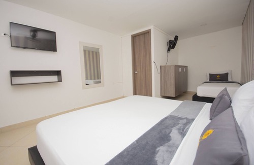 Bello Hotel | Cozy Room for 3 in Family-Friendly Bello