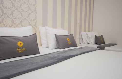 Bello Hotel | Cozy Room for 3 in Family-Friendly Bello