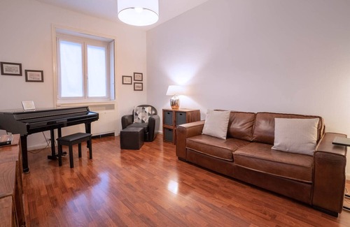 Citta Bassa Apartment | Inviting Furnished Apartment with Spa and Kitchen Amenities