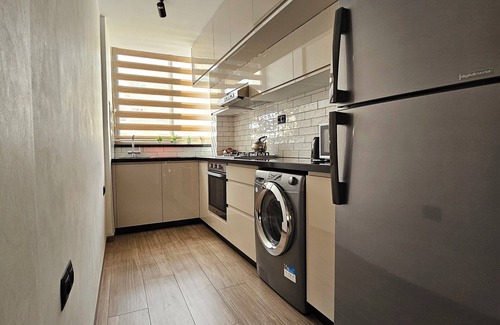 Cite Al Mohammadi Apartment | Inviting Three-Room Apartment with Ocean View & Parking