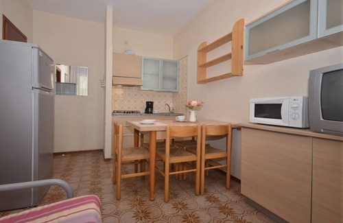 Bibione Apartment | Comfortable two room apartment with garden and swimming pool by Beahost Rentals