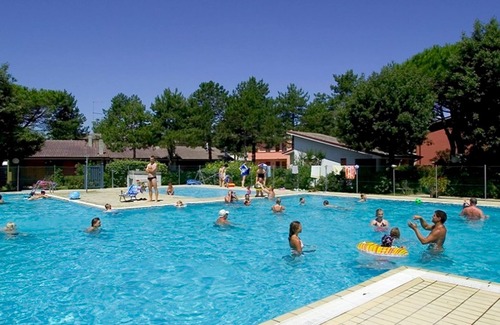 Bibione Apartment | Comfortable two room apartment with garden and swimming pool by Beahost Rentals