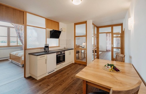 Bad Fuessing Apartment | Spacious Suite with Kitchenette and Balcony Awaits You