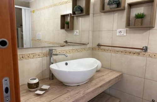 Ladispoli Apartment | Exceptional ComfortHouse Garden: Pet-Friendly Retreat