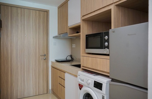 Pondok Aren House | Cozy Minimalist Studio with Pool at Embarcadero Bintaro