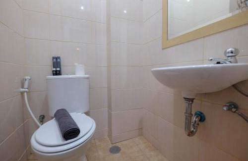 Depok Apartment | Cozy Studio Retreat at Dave Apartment By Travelio