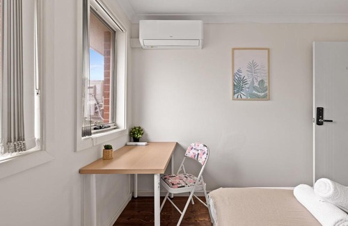 Panania House | Inviting Double Room with Kitchen at Panania Guesthouse