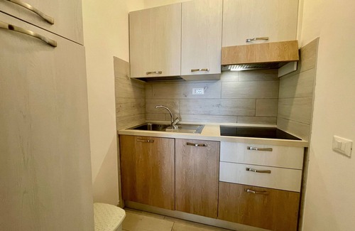 Porto Santa Margherita Apartment | Cozy Retreat with Balcony and Shared Pool - Beahost