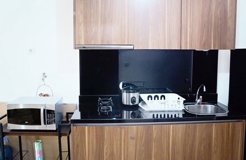 Pancoran Apartment | Cozy L'Avenue Apartment with Pool and Family-Friendly Perks